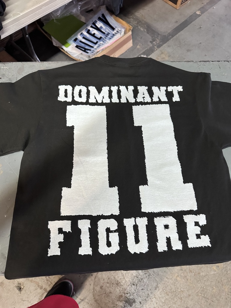 Dominant Figure puff print on black heavyweight tee